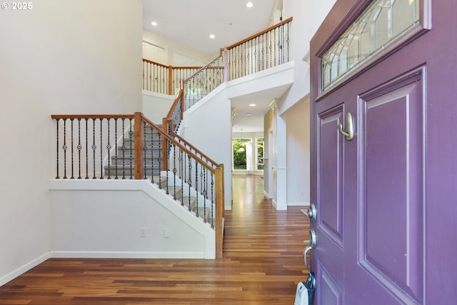 16273 Barlow Dr, Oregon City, OR 97045 - entryway featuring wood finished floors, stairway, a towering ceiling, and recessed lighting
