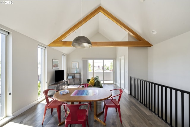 4984 NE 32nd Pl, Portland, OR 97211 - dining area with wood finished floors, high vaulted ceiling, and baseboards