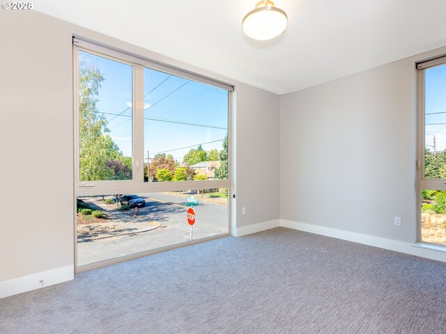4984 NE 32nd Pl, Portland, OR 97211 - carpeted empty room featuring baseboards