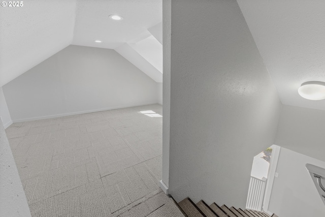 320 NE 117th Ave, Portland, OR 97220 - additional living space with lofted ceiling, recessed lighting, and carpet floors