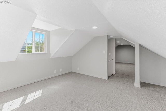 320 NE 117th Ave, Portland, OR 97220 - additional living space featuring carpet flooring, lofted ceiling, recessed lighting, and baseboards