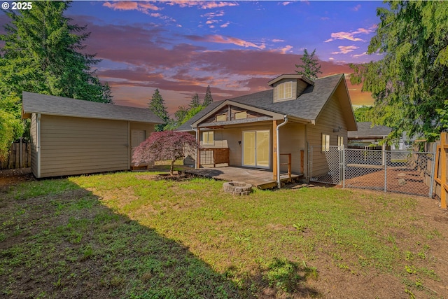 320 NE 117th Ave, Portland, OR 97220 - rear view of property featuring an outbuilding and a patio area