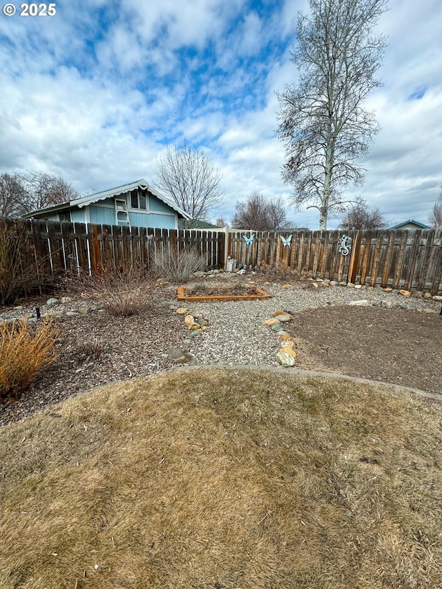 view of yard featuring fence