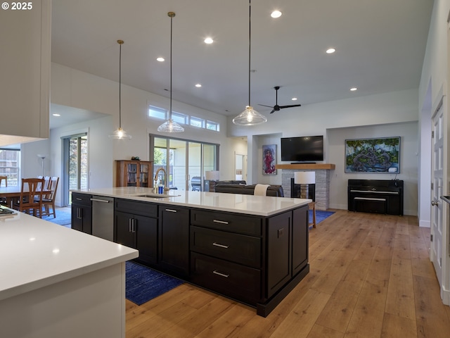 1703 SE 42nd Way, Brush Prairie, WA 98606 - kitchen featuring dishwasher, light countertops, light wood-style flooring, healthy amount of natural light, and recessed lighting