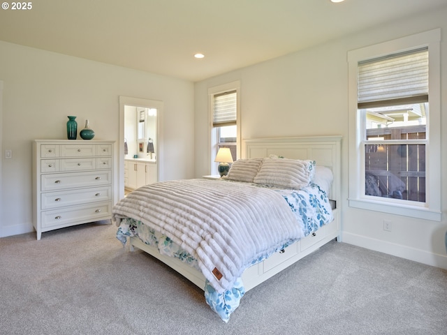 1703 SE 42nd Way, Brush Prairie, WA 98606 - bedroom with carpet, multiple windows, recessed lighting, and ensuite bath