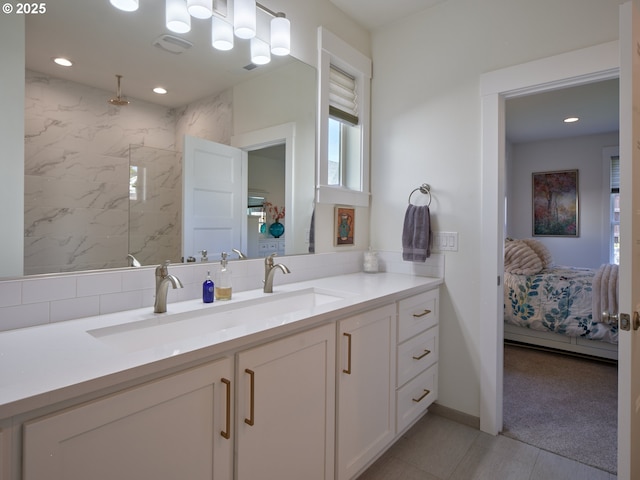 1703 SE 42nd Way, Brush Prairie, WA 98606 - ensuite bathroom featuring vanity, a marble finish shower, and recessed lighting
