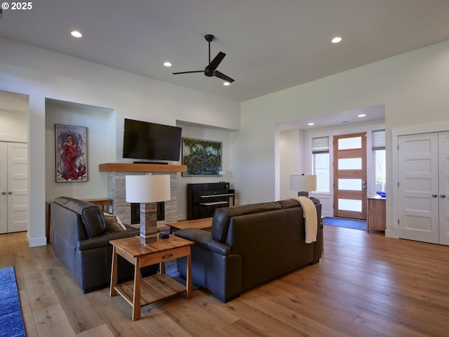 1703 SE 42nd Way, Brush Prairie, WA 98606 - living area featuring ceiling fan, recessed lighting, hardwood / wood-style flooring, and a fireplace