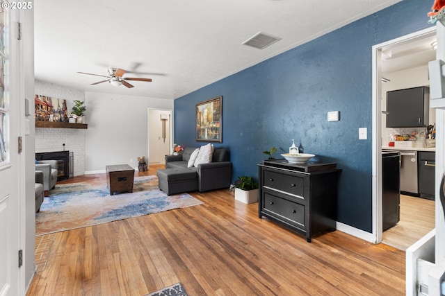 2408 N College St, Newberg, OR 97132 - living room featuring light wood-style floors and ceiling fan
