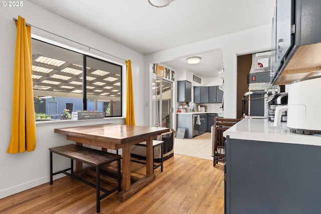 2408 N College St, Newberg, OR 97132 - dining area with light wood finished floors and baseboards