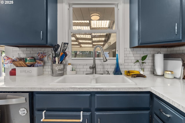 2408 N College St, Newberg, OR 97132 - kitchen featuring blue cabinets, a sink, and stainless steel dishwasher