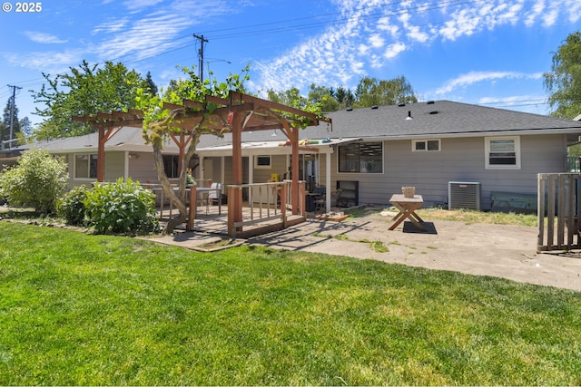 2408 N College St, Newberg, OR 97132 - back of house with a pergola, a patio, a lawn, central air condition unit, and a wooden deck