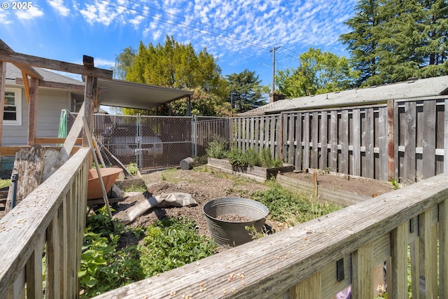 2408 N College St, Newberg, OR 97132 - fenced backyard with a garden