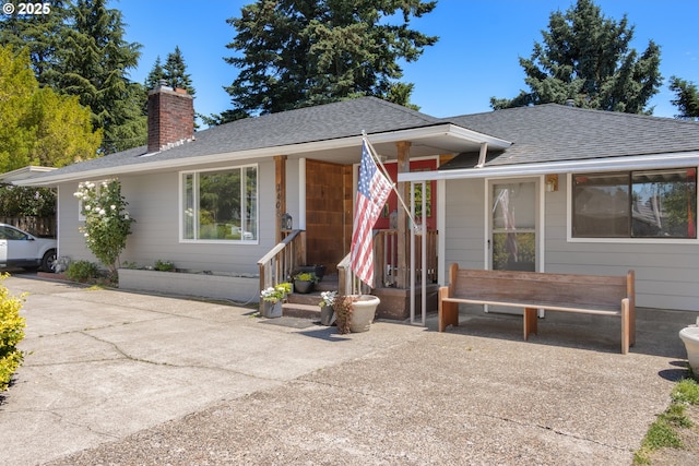 2408 N College St, Newberg, OR 97132 - single story home with roof with shingles and a chimney