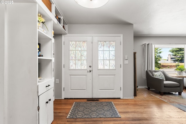 2408 N College St, Newberg, OR 97132 - foyer featuring light wood-style floors, baseboards, and french doors