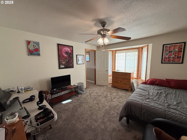 bedroom with light colored carpet, a textured ceiling, and ceiling fan