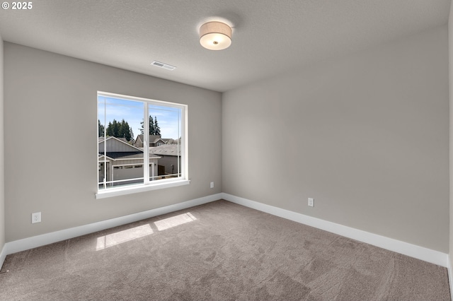 12216 NE 107th Way, Vancouver, WA 98682 - carpeted spare room with baseboards and a textured ceiling