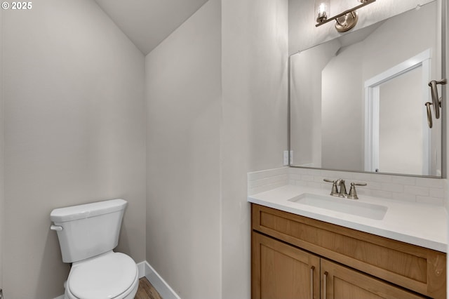 12216 NE 107th Way, Vancouver, WA 98682 - bathroom featuring vanity, lofted ceiling, and wood finished floors