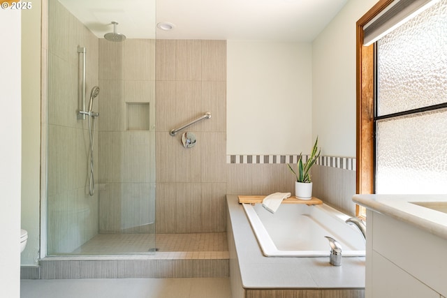 511 SW Colony Dr, Portland, OR 97219 - full bathroom with tiled shower, a garden tub, and vanity