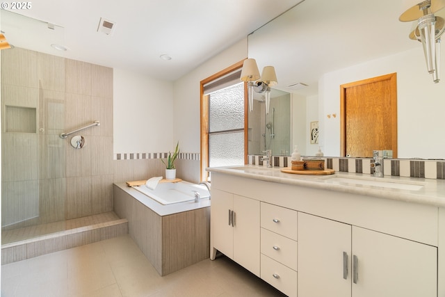511 SW Colony Dr, Portland, OR 97219 - bathroom featuring walk in shower, double vanity, a garden tub, and tile patterned flooring