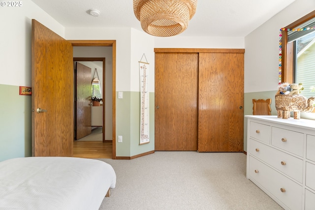 511 SW Colony Dr, Portland, OR 97219 - bedroom with a closet and light carpet