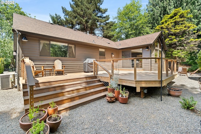 511 SW Colony Dr, Portland, OR 97219 - rear view of property featuring a wooden deck and roof with shingles