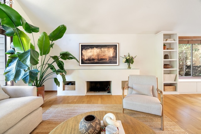 511 SW Colony Dr, Portland, OR 97219 - living room with a fireplace and wood finished floors