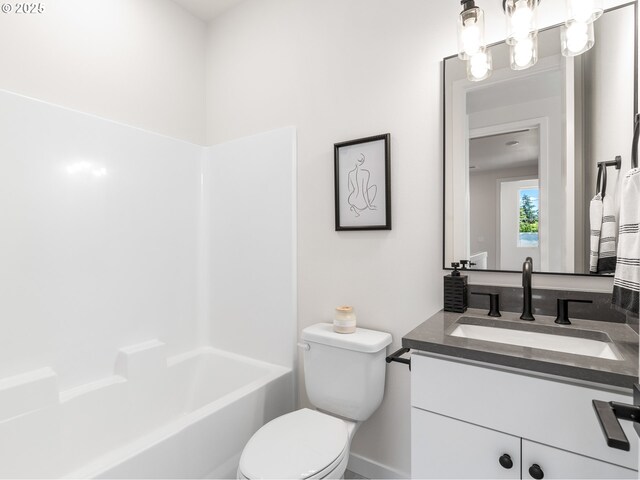 7244 SE 78th Ave Unit 2, Portland, OR 97206 - full bathroom featuring vanity, toilet, and shower / washtub combination