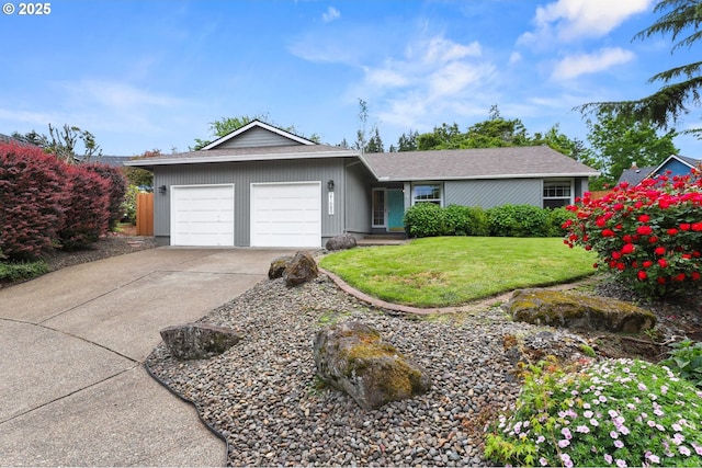 21689 SW Klickitat Ct, Tualatin, OR 97062 - ranch-style house with an attached garage, driveway, and a front yard