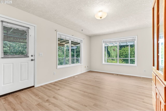 18183 SE Richey Rd, Gresham, OR 97080 - entrance foyer with a textured ceiling and light wood finished floors