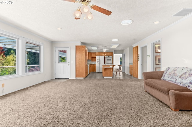 18183 SE Richey Rd, Gresham, OR 97080 - living area featuring ornamental molding, ceiling fan, recessed lighting, light carpet, and a textured ceiling