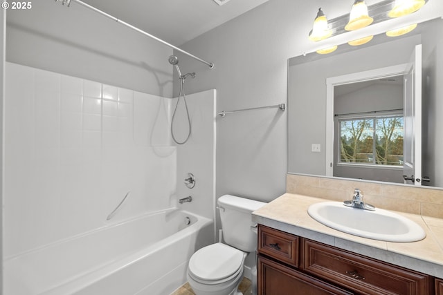 full bathroom with vanity, bathing tub / shower combination, and toilet