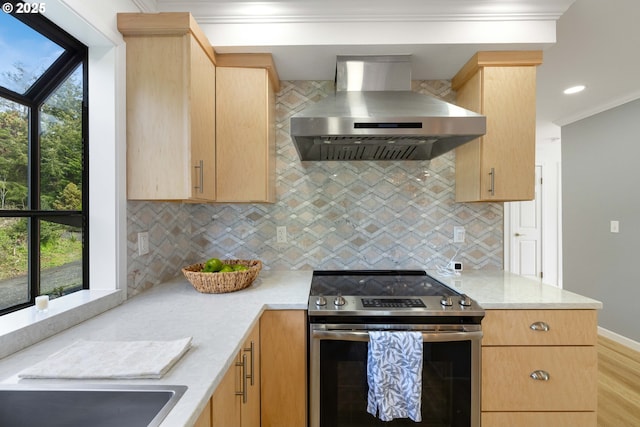 66599 Quail Rd, North Bend, OR 97459 - kitchen with electric stove, wall chimney range hood, light brown cabinets, crown molding, and decorative backsplash