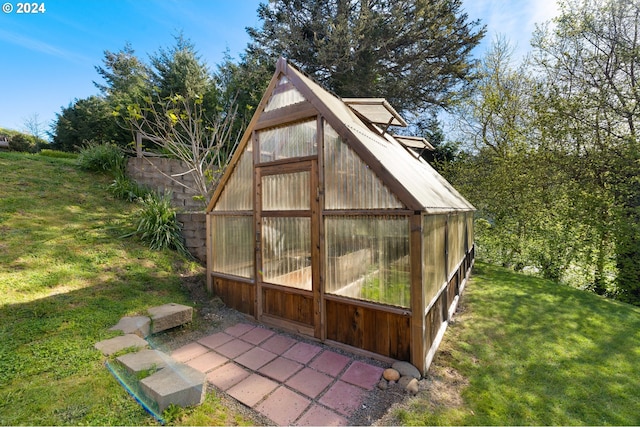 66599 Quail Rd, North Bend, OR 97459 - view of greenhouse featuring a lawn