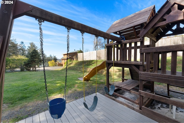 66599 Quail Rd, North Bend, OR 97459 - wooden deck featuring a playground