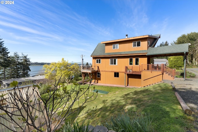66599 Quail Rd, North Bend, OR 97459 - rear view of house featuring stairway, a yard, a deck, and roof with shingles
