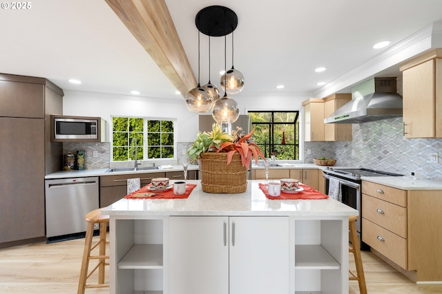 66599 Quail Rd, North Bend, OR 97459 - kitchen with open shelves, wall chimney range hood, stainless steel appliances, backsplash, and light brown cabinets
