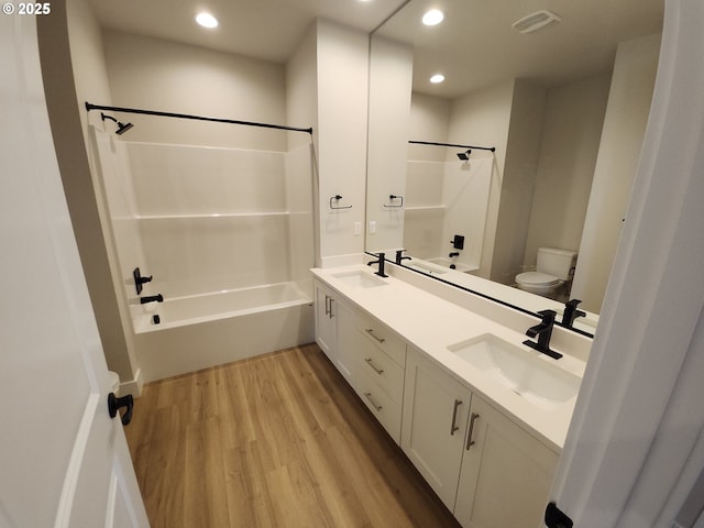 5602 N 93rd Ave Unit Lt205, Camas, WA 98607 - full bath featuring wood finished floors, shower / washtub combination, double vanity, and recessed lighting