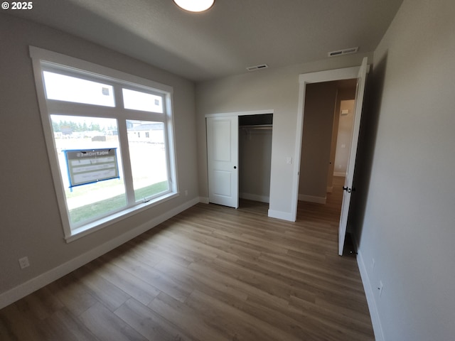 5602 N 93rd Ave Unit Lt205, Camas, WA 98607 - unfurnished bedroom with wood finished floors and a closet