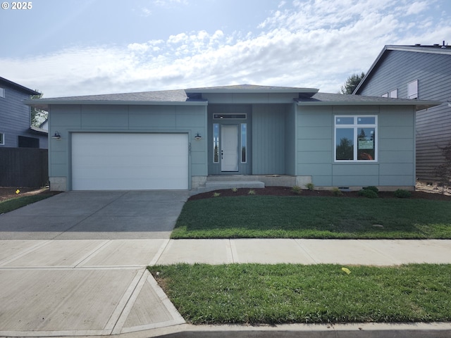 5602 N 93rd Ave Unit Lt205, Camas, WA 98607 - view of front facade featuring an attached garage, driveway, and a front yard