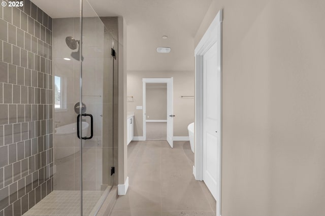 5602 N 93rd Ave Unit Lt205, Camas, WA 98607 - bathroom featuring a shower stall, a freestanding bath, and tile patterned flooring
