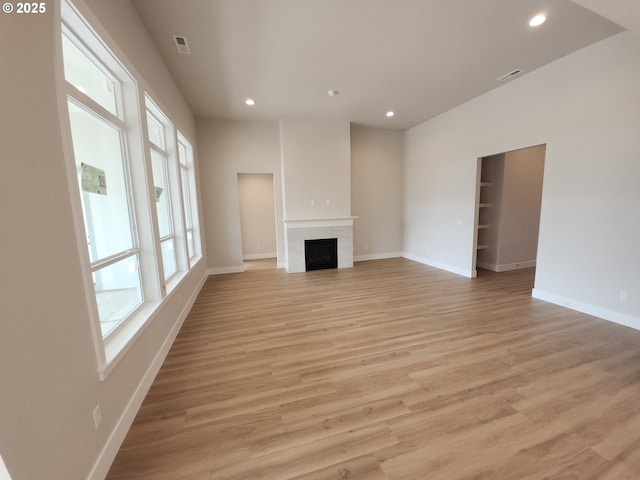 5602 N 93rd Ave Unit Lt205, Camas, WA 98607 - unfurnished living room featuring recessed lighting, light wood-style flooring, and a fireplace