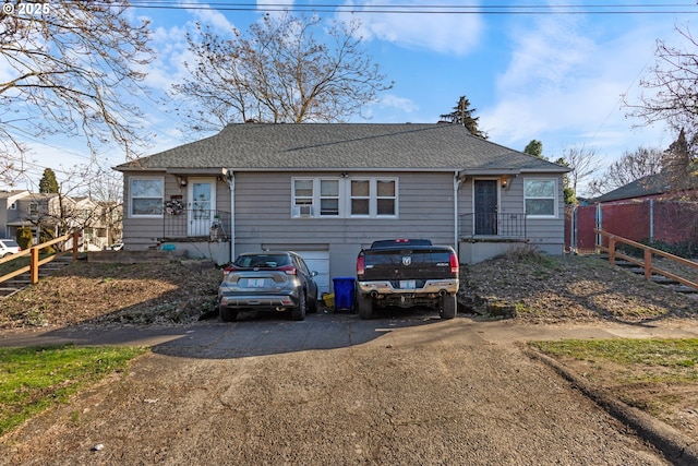 view of front of home with a garage