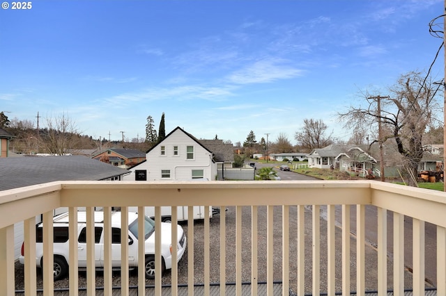 balcony featuring a residential view