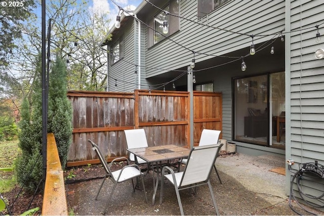 view of patio / terrace with fence and outdoor dining area