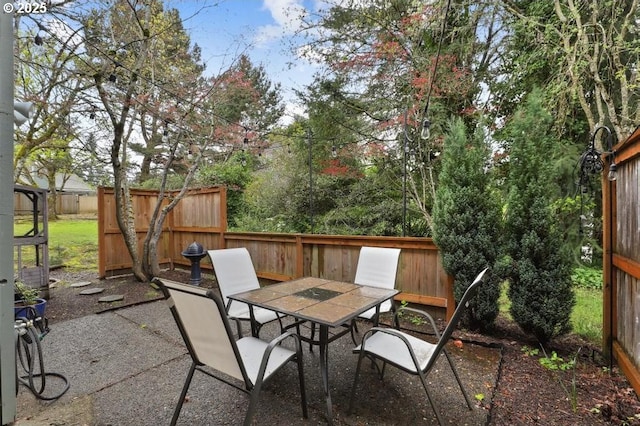 view of patio / terrace with fence and outdoor dining area