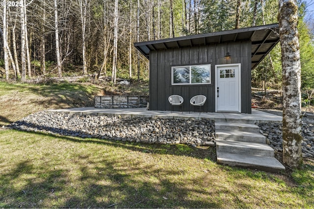 view of outbuilding with an outdoor structure