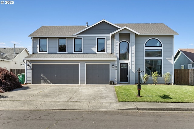 17006 SE 6th St, Vancouver, WA 98684 - traditional home featuring an attached garage, concrete driveway, and a shingled roof