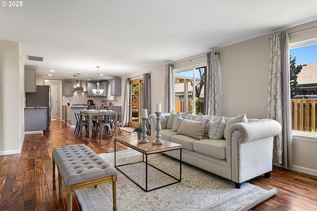 17006 SE 6th St, Vancouver, WA 98684 - living area featuring dark wood-style flooring, baseboards, and recessed lighting