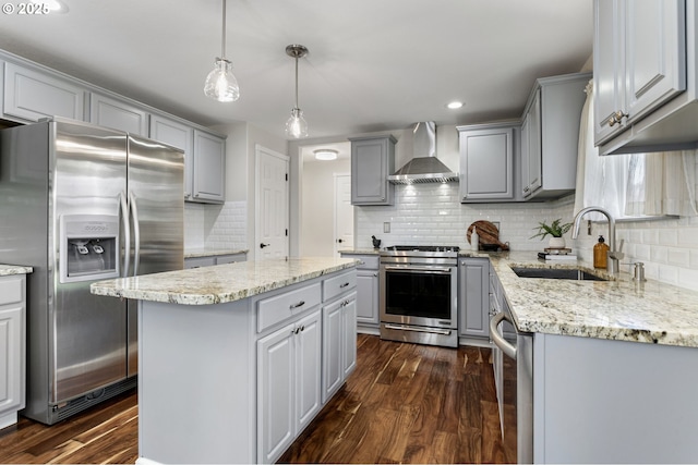 17006 SE 6th St, Vancouver, WA 98684 - kitchen featuring appliances with stainless steel finishes, wall chimney range hood, gray cabinetry, a sink, and recessed lighting