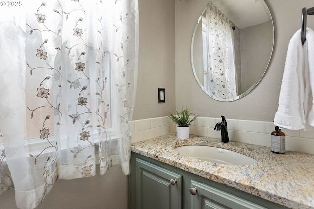 17006 SE 6th St, Vancouver, WA 98684 - bathroom with vanity and decorative backsplash